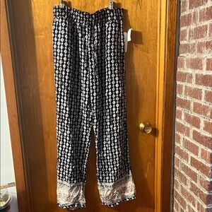 Eye Candy Navy and White Patterned Trousers Size large